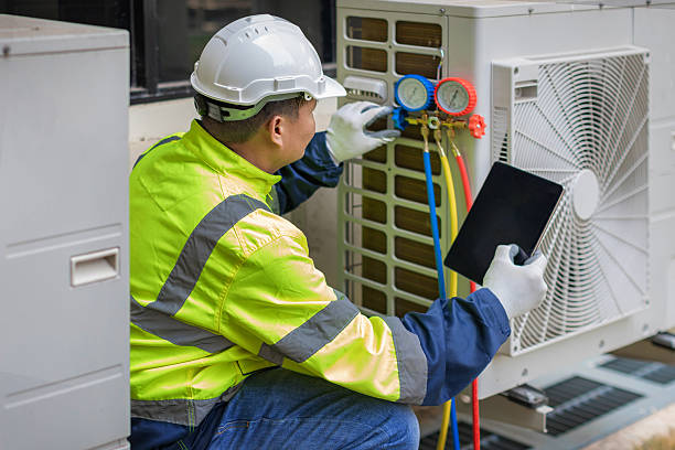 Professional Hvac technician working in Godwin, NC
